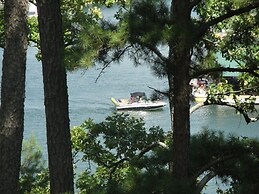 Lake view two bedroom, two bath log-sided cottage with private hot tub