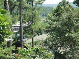 Lake view two bedroom, two bath log-sided cottage with private hot tub