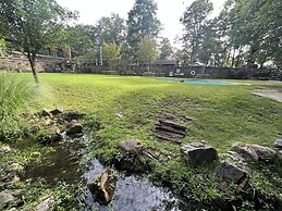 Lake view two bedroom, two bath log-sided cottage with private hot tub
