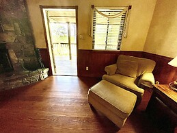 Lake view two bedroom, two bath log-sided cottage with private hot tub