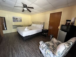 JI4, King Guest Room at the Joplin Inn at entrance to the resort by Re