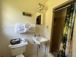 JI4, King Guest Room at the Joplin Inn at entrance to the resort by Re