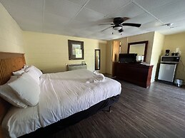 JI4, King Guest Room at the Joplin Inn at entrance to the resort by Re