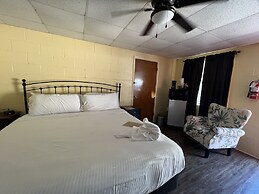 JI4, King Guest Room at the Joplin Inn at entrance to the resort by Re
