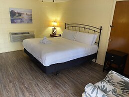 JI4, King Guest Room at the Joplin Inn at entrance to the resort by Re