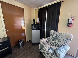 JI4, King Guest Room at the Joplin Inn at entrance to the resort by Re