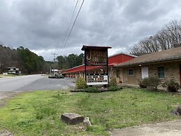 JI6, King Guest Room at the Joplin Inn at entrance to the resort by Re