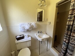 JI6, King Guest Room at the Joplin Inn at entrance to the resort by Re