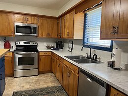 Two bedroom House with fenced in yard, covered patio area, located at 