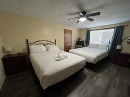 Queen Guest Room located at the Joplin Inn at the entrance to Mountain