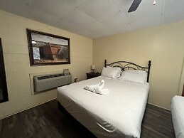 Queen Guest Room located at the Joplin Inn at the entrance to Mountain