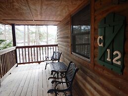 Luxury, loft, log-sided two bedroom Harbor North cottage on Lake Ouach