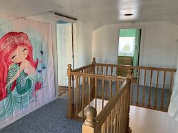 Mermaids & Mutts 3 Bedroom Bungalow by RedAwning