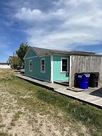 Sandy Mutts At The Beach 1 Bedroom Cottage by RedAwning