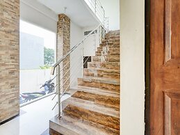 OYO Life 90606 Glass House Citraland Syariah