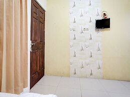 OYO Life 90606 Glass House Citraland Syariah