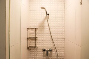 Warm And Minimalist 2Br Green Bay Pluit Apartment