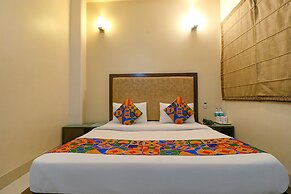 FabHotel Happy Residency