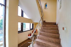 FabHotel Happy Residency