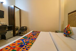 FabHotel Happy Residency