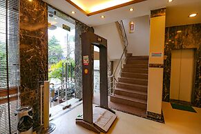 FabHotel Happy Residency