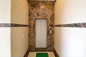 FabHotel Happy Residency