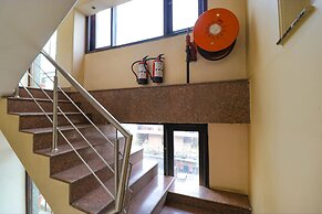 FabHotel Happy Residency