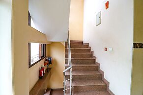 FabHotel Happy Residency