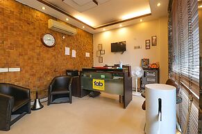 FabHotel Happy Residency