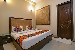 FabHotel Happy Residency