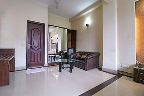 FabHotel Happy Residency