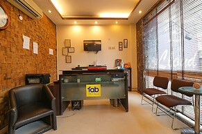 FabHotel Happy Residency