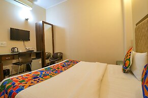 FabHotel Happy Residency