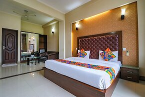 FabHotel Happy Residency