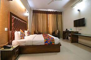 FabHotel Happy Residency