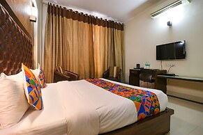 FabHotel Happy Residency