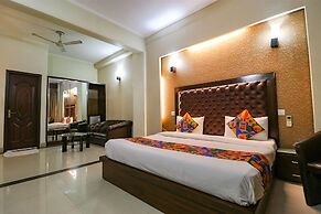 FabHotel Happy Residency