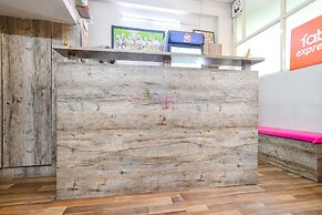 Fabexpress Royal Palace Inn