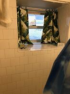 Rustic Beach Front Basement Apt, Pet Friendly Wi-fi 2 Bedroom Apts by 