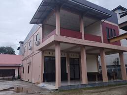 OYO 92243 Fanilly Guest House MarabahanNearJembatan Rumpiang