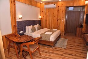 Qcent Woods Spa & Resort