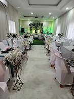 The Charis Hotel and Suites