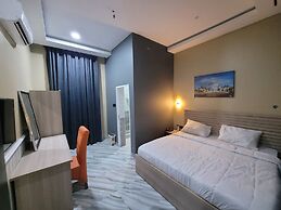 The Charis Hotel and Suites