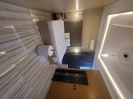 The Charis Hotel and Suites