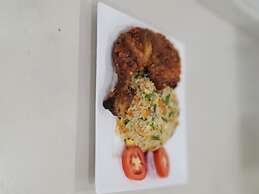 The Charis Hotel and Suites