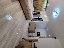 The Charis Hotel and Suites