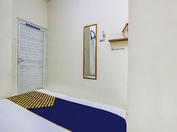 SPOT ON 90780 Gang Tengah Homestay Syariah