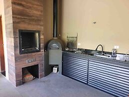 linda casa de campo nova em condominio