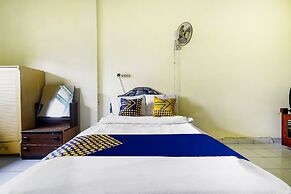 SPOT ON 91064 Wisma Lec Syariah