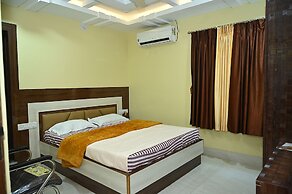 Fabhotel Golden Bliss